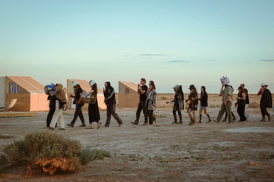 Ceremonial walk on the Mars campus honoring the ancestors.